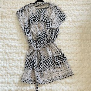 Never worn faux wrap dress with belt tie. Light weight, hits just at knee. 3x